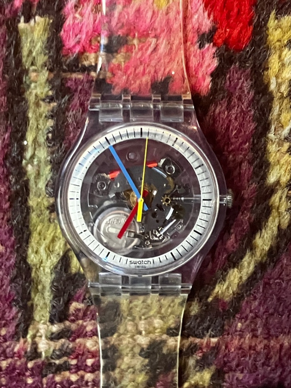 Swatch Clear Skeleton Watch with Blue, Yellow, Red Hands